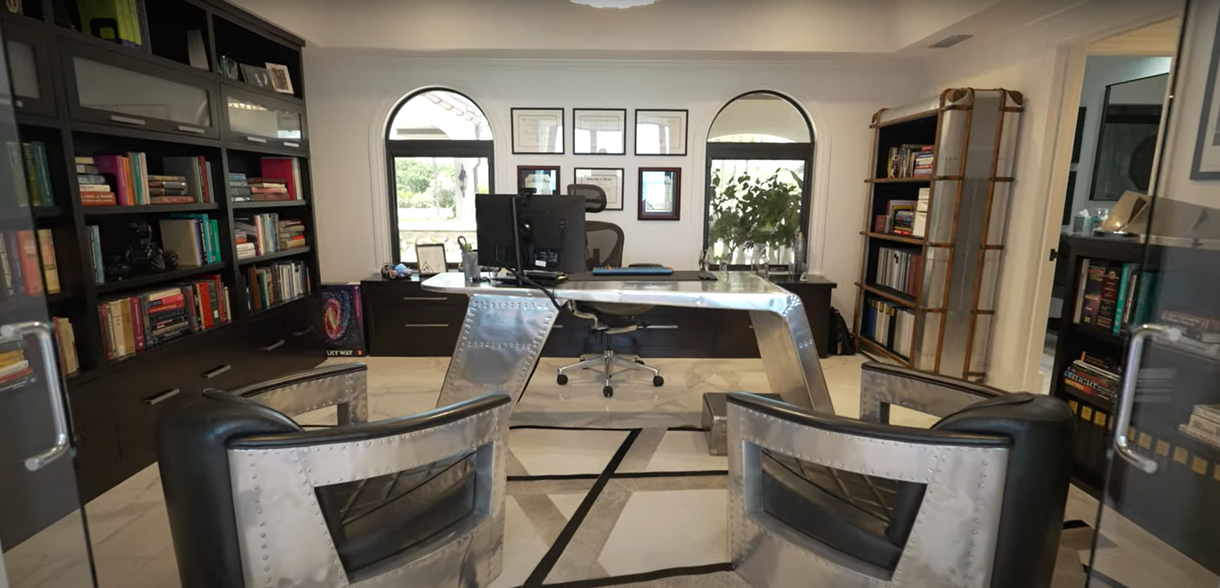 home renovation Vero Beach FL custom home office with built in shelving and modern desk