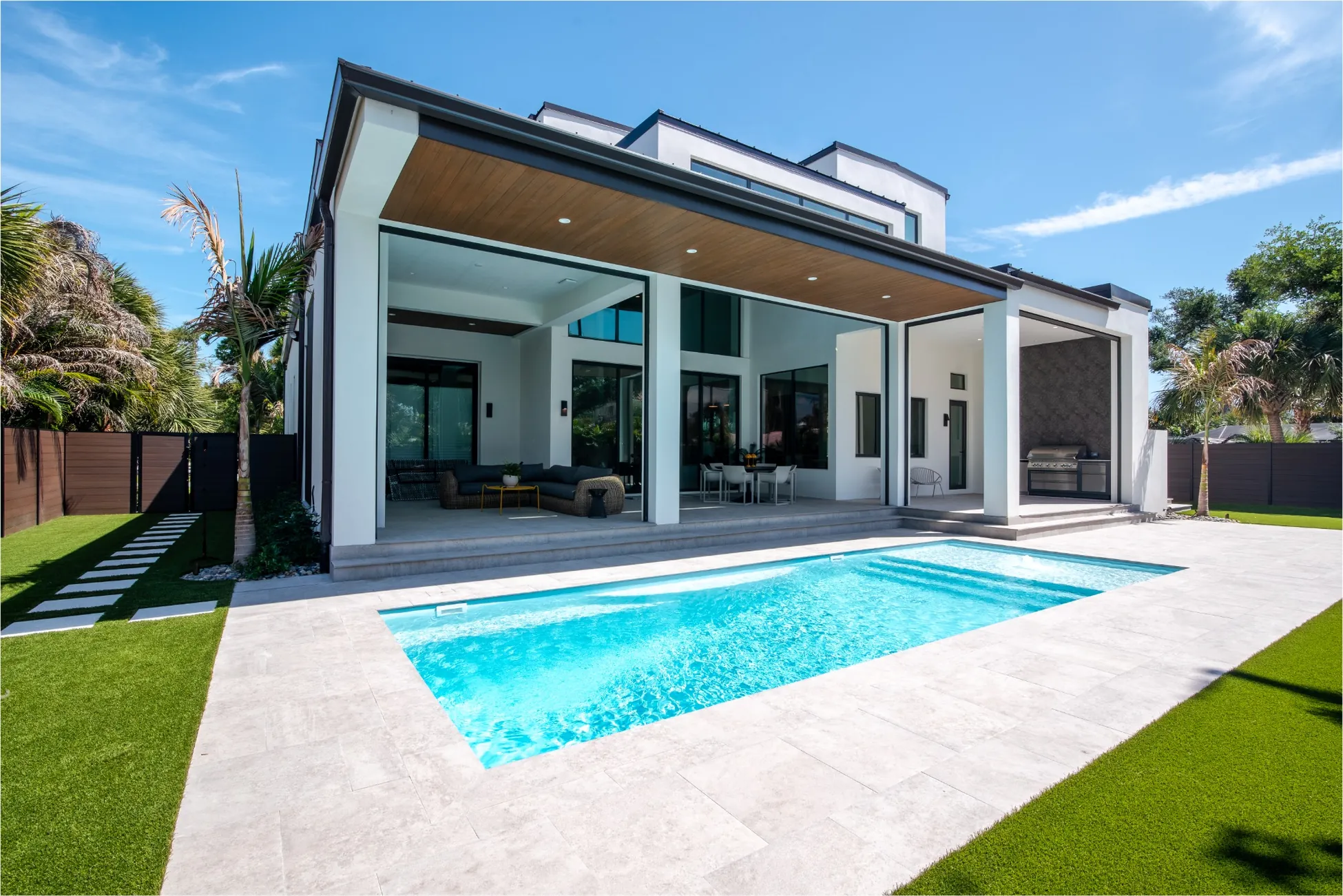 Modern home entry with floating staircase and high ceilings in Vero Beach FL<br />
